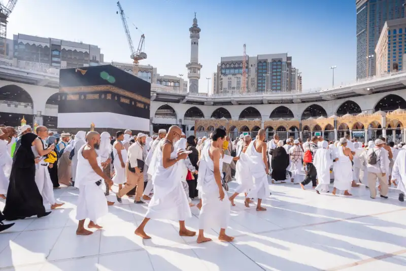 Pilgrims at Masjid al Haram before their Makkah to Jeddah airport taxi